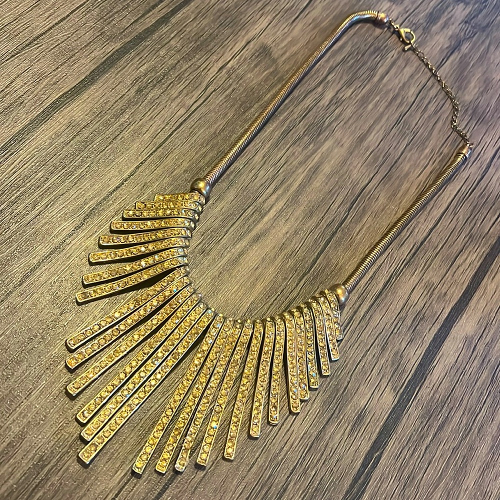 Gold necklace with multi length tiers
